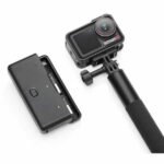 Action camera with grip and battery case