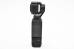 Handheld 3-axis gimbal camera on white background