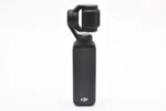DJI handheld gimbal camera on white background
